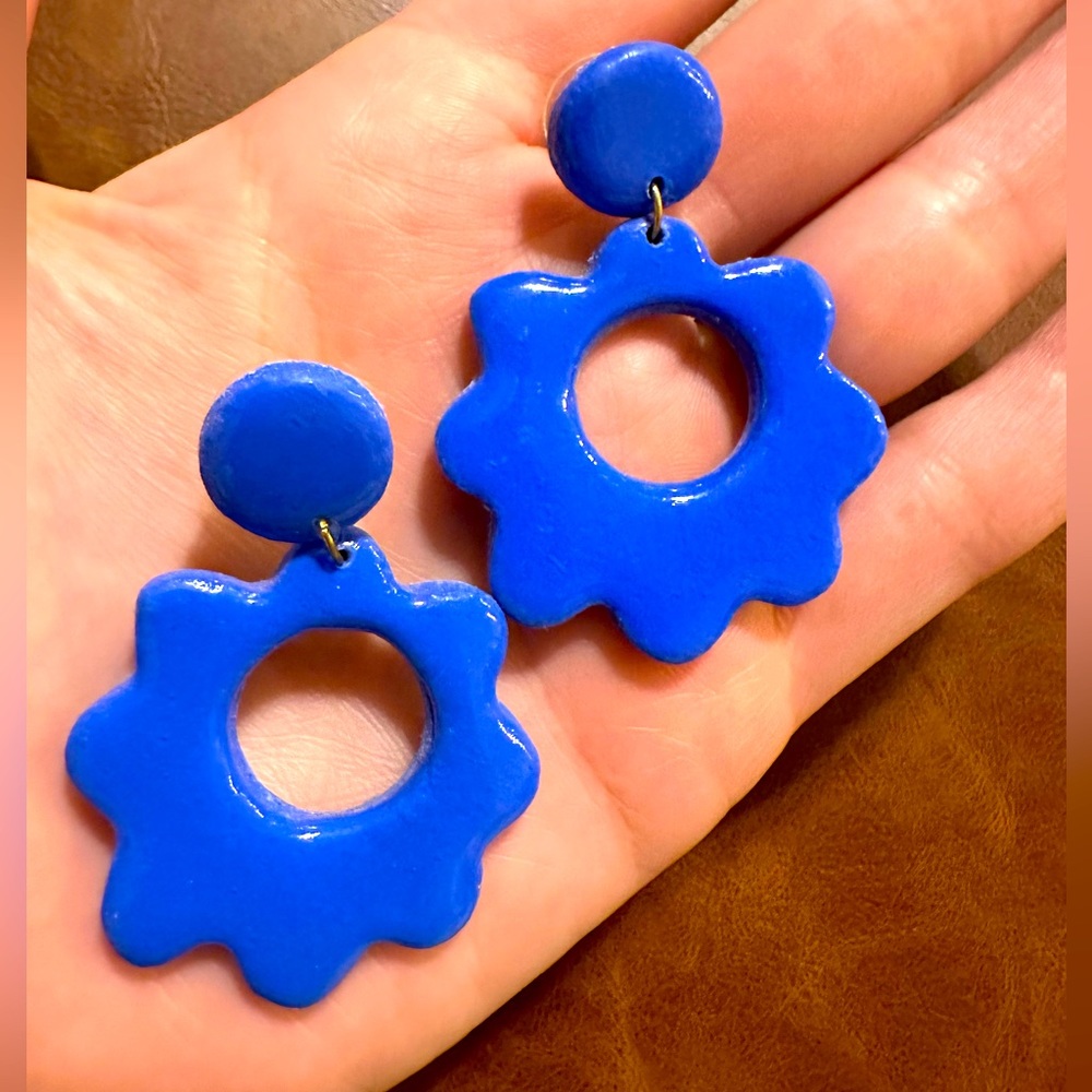 Electric blue clay earrings with acrylic coated flowers